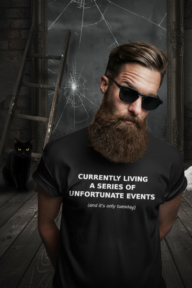 Man wearing sunglasses and a black t-shirt with humorous text on a white background